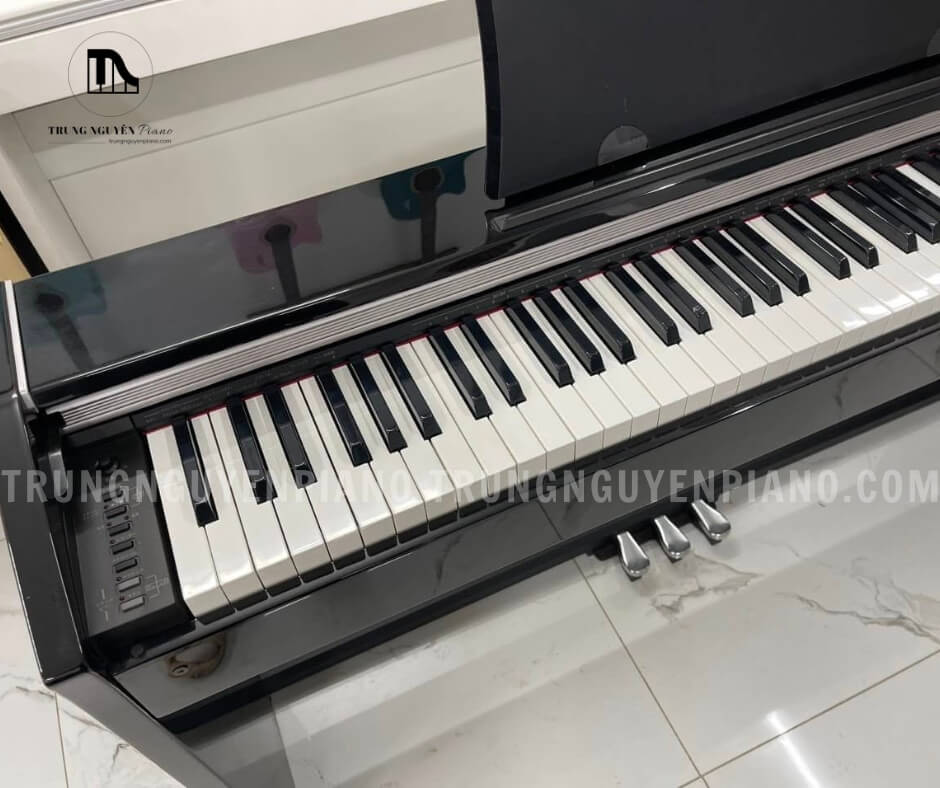 Piano điện Casio PX1000BP 4 Piano điện Casio PX1000BP sở hữu bàn phím 88 phím với công nghệ Scaling Hammer Action Keyboard