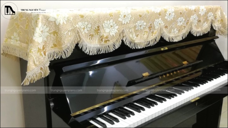 Sử dụng khăn phủ đàn để chống bụi