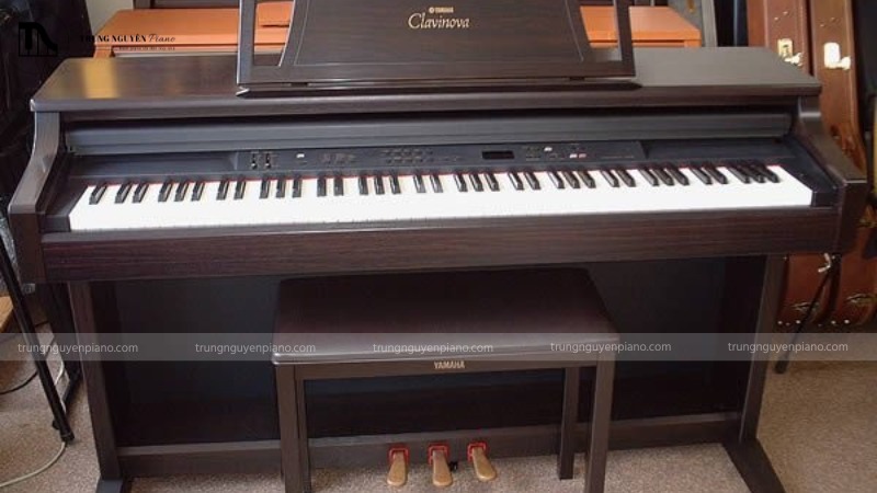 Tại sao Piano Điện cao cấp lại có giá ngang Piano Cơ? 3 Một cây piano điện cao cấp với thiết kế sang trọng, với chất liệu gỗ cao cấp