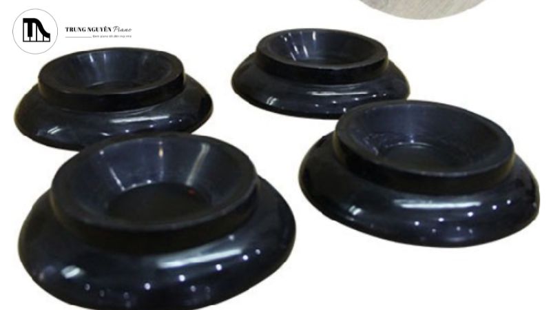 Chén kê chân piano nhựa (hoặc vật liệu tổng hợp)