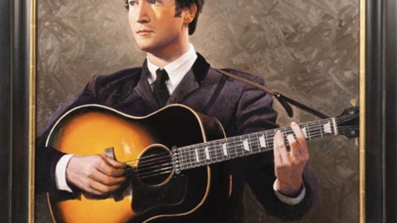 John Lennon thời trẻ cùng cây đàn Gibson J-160E huyền thoại