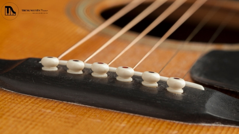 Mài ngựa đàn guitar: Hướng dẫn hạ action an toàn tại nhà 2 Dấu hiệu nên màu ngựa đàn guitar