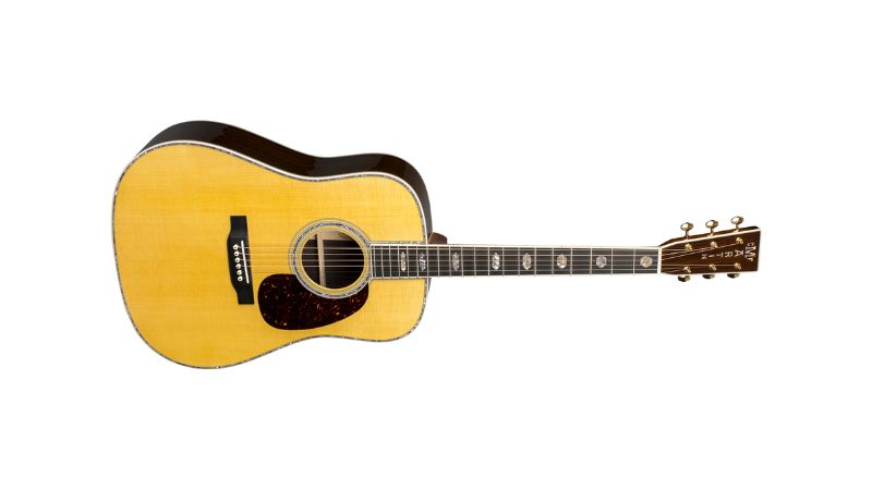 Bề mặt đàn guitar làm từ gỗ Vân Sam nguyên khối cho âm thanh vang và sáng