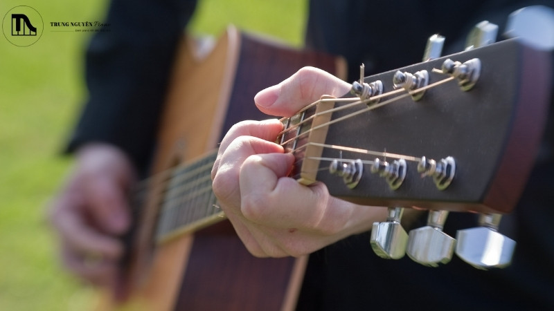 Chơi guitar bằng ngón tay